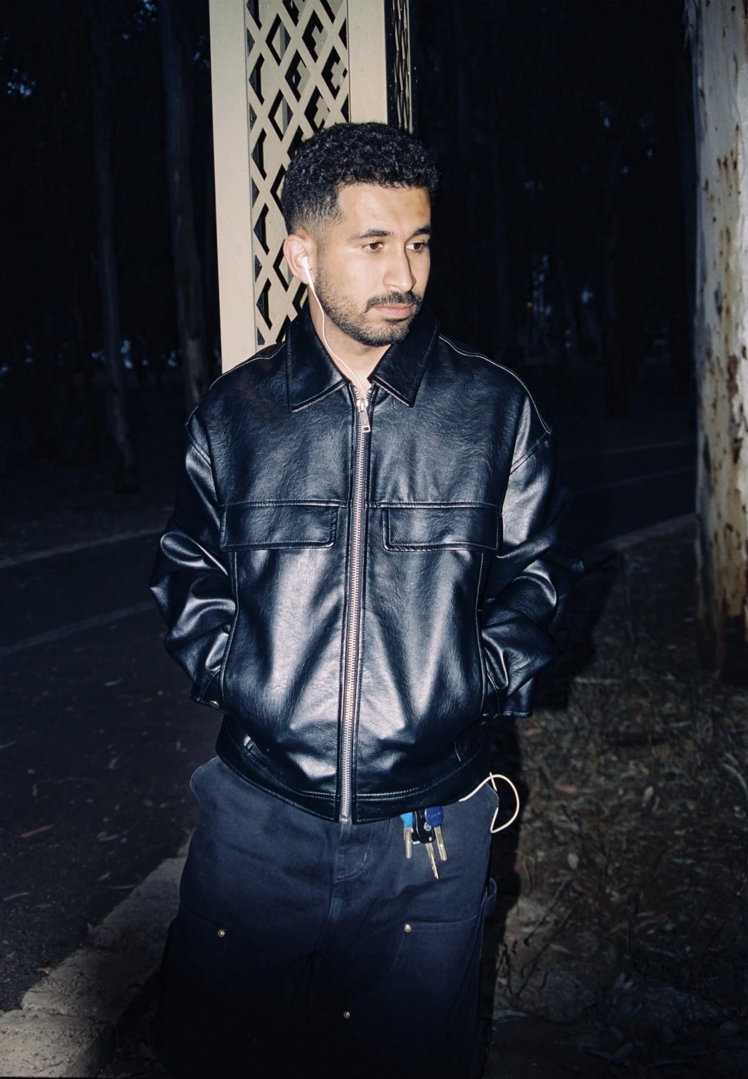 MOZES in a black leather jacket